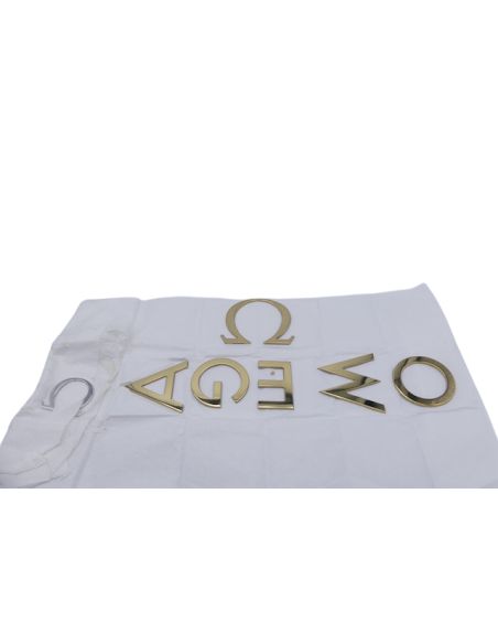 Omega lettres Logo - golden letters
